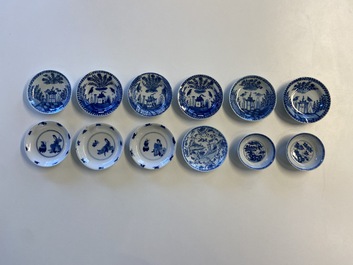Twenty-seven Chinese blue and white saucers and seven cups, Kangxi and later