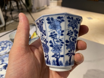 Twenty-one Chinese blue and white saucers and eighteen cups, Kangxi