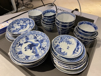 Twenty-one Chinese blue and white saucers and eighteen cups, Kangxi
