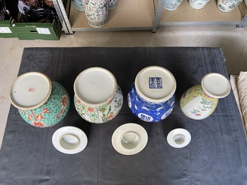 Four various Chinese famille rose, verte and blue and white vases, 19/20th C.