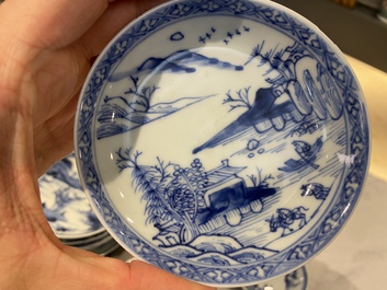 Twenty-one Chinese blue and white saucers and eighteen cups, Kangxi