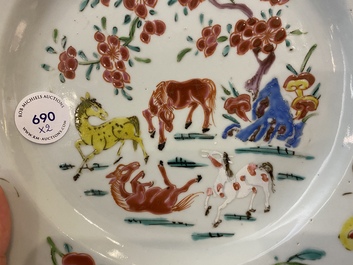 A pair of Chinese famille rose 'horse' plates, Yongzheng/Qianlong