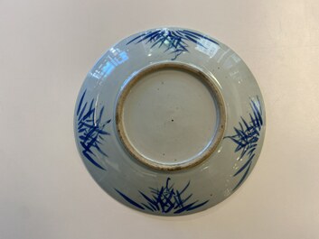 Three Chinese blue and white dishes with dragons, phoenixes and Buddhist lions, 19th C.