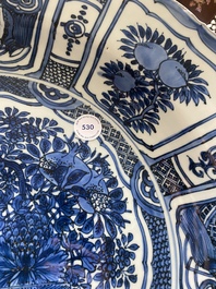 A large Chinese blue and white kraak porcelain dish with a finely painted jardini&egrave;re, Wanli