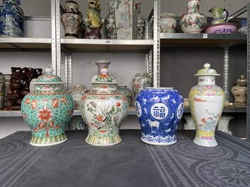 Four various Chinese famille rose, verte and blue and white vases, 19/20th C.