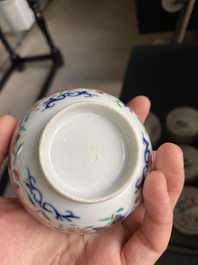 Thirteen Chinese famille rose saucers and twelve cups, Qianlong