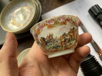 A varied collection of Chinese famille rose and grisaille cups and saucers and a 'rooster' bowl, Yongzheng/Qianlong
