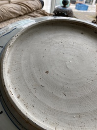 A large Chinese blue and white kraak porcelain dish with a finely painted jardini&egrave;re, Wanli