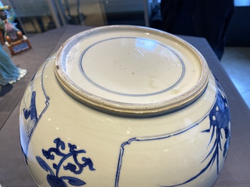 A Chinese blue and white bowl with figures in a landscape, Kangxi