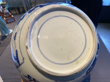 A Chinese blue and white bowl with figures in a landscape, Kangxi
