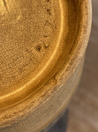 A Japanese Hizen Kakiemon-style vase with copper rim, Edo, 18th C.