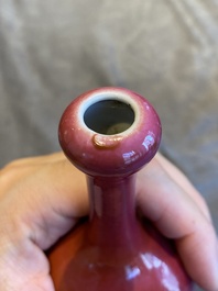 A Chinese monochrome ruby-glazed garlic head bottle vase, Qianlong mark, Republic