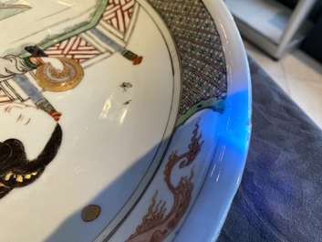 A Chinese famille verte dish with a lady and two playing boys, Kangxi