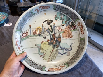 A Chinese famille verte dish with a lady and two playing boys, Kangxi