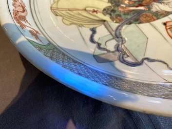 A Chinese famille verte dish with a lady and two playing boys, Kangxi