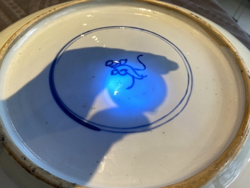A Chinese famille verte dish with a lady and two playing boys, Kangxi