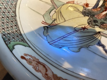 A Chinese famille verte dish with a lady and two playing boys, Kangxi