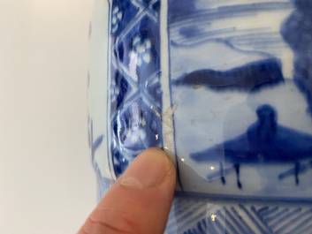 A large Chinese blue and white garniture of three vases, Kangxi