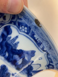 A large Chinese blue and white garniture of three vases, Kangxi