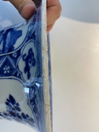 A large Chinese blue and white garniture of three vases, Kangxi