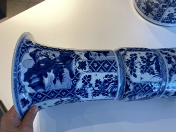 A large Chinese blue and white garniture of three vases, Kangxi