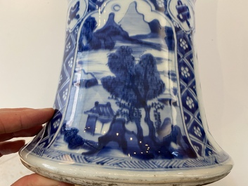 A large Chinese blue and white garniture of three vases, Kangxi