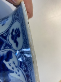 A large Chinese blue and white garniture of three vases, Kangxi