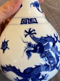 A Chinese blue and white 'dragons' bottle vase, Jiajing mark, 19/20th C.