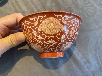 A Chinese coral-ground reserve-decorated 'lotus' bowl, Jiaqing mark, 19/20th C.