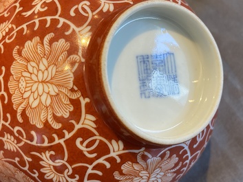 A Chinese coral-ground reserve-decorated 'lotus' bowl, Jiaqing mark, 19/20th C.