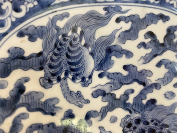 A Japanese blue and white Arita dish with sea turtles, Edo, 18th C.