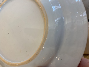 A Chinese blue and white 'dragon' dish and three iron-red and famille rose plates, 18th C.