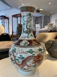 A Chinese famille verte 'dragons' bottle vase, Guangxu mark, 20th C.