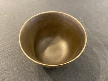 A Chinese blue enamel on gilt &lsquo;Shou&rsquo; tea bowl, 18/19th C.