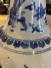 A Chinese blue and white bottle vase with a dragon on the neck, Transitional period
