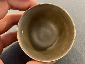 A Chinese blue enamel on gilt &lsquo;Shou&rsquo; tea bowl, 18/19th C.