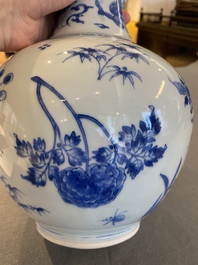 A Chinese blue and white bottle vase with a dragon on the neck, Transitional period