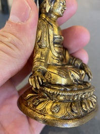 A small Sino-Tibetan gilt bronze Buddha, 19th C.