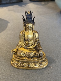 A small Sino-Tibetan gilt bronze Buddha, 19th C.