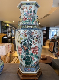 A hexagonal Chinese famille rose vase with antiquities and peacocks, 19th C.