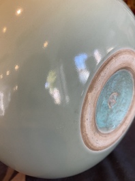 A Chinese monochrome celadon-glazed double gourd vase, 18/19th C.