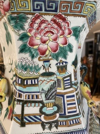 A hexagonal Chinese famille rose vase with antiquities and peacocks, 19th C.