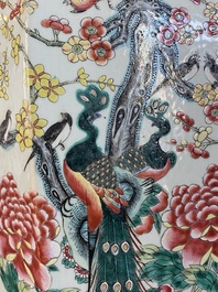 A hexagonal Chinese famille rose vase with antiquities and peacocks, 19th C.