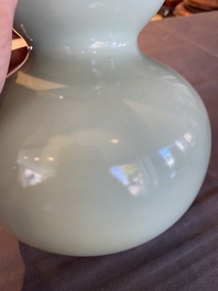 A Chinese monochrome celadon-glazed double gourd vase, 18/19th C.