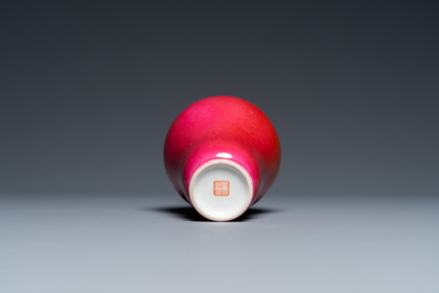 A Chinese monochrome ruby-glazed garlic head bottle vase, Qianlong mark, Republic