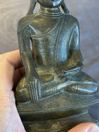 A Burmese bronze Shan-style Buddha Shakyamuni with inscription, Konbaung dynasty, 18th C.