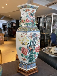 A hexagonal Chinese famille rose vase with antiquities and peacocks, 19th C.