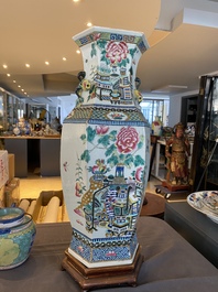 A hexagonal Chinese famille rose vase with antiquities and peacocks, 19th C.