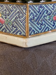A hexagonal Chinese famille rose vase with antiquities and peacocks, 19th C.