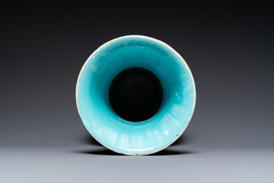 A Chinese famille noire vase with grisaille and iron-red design, 19th C.